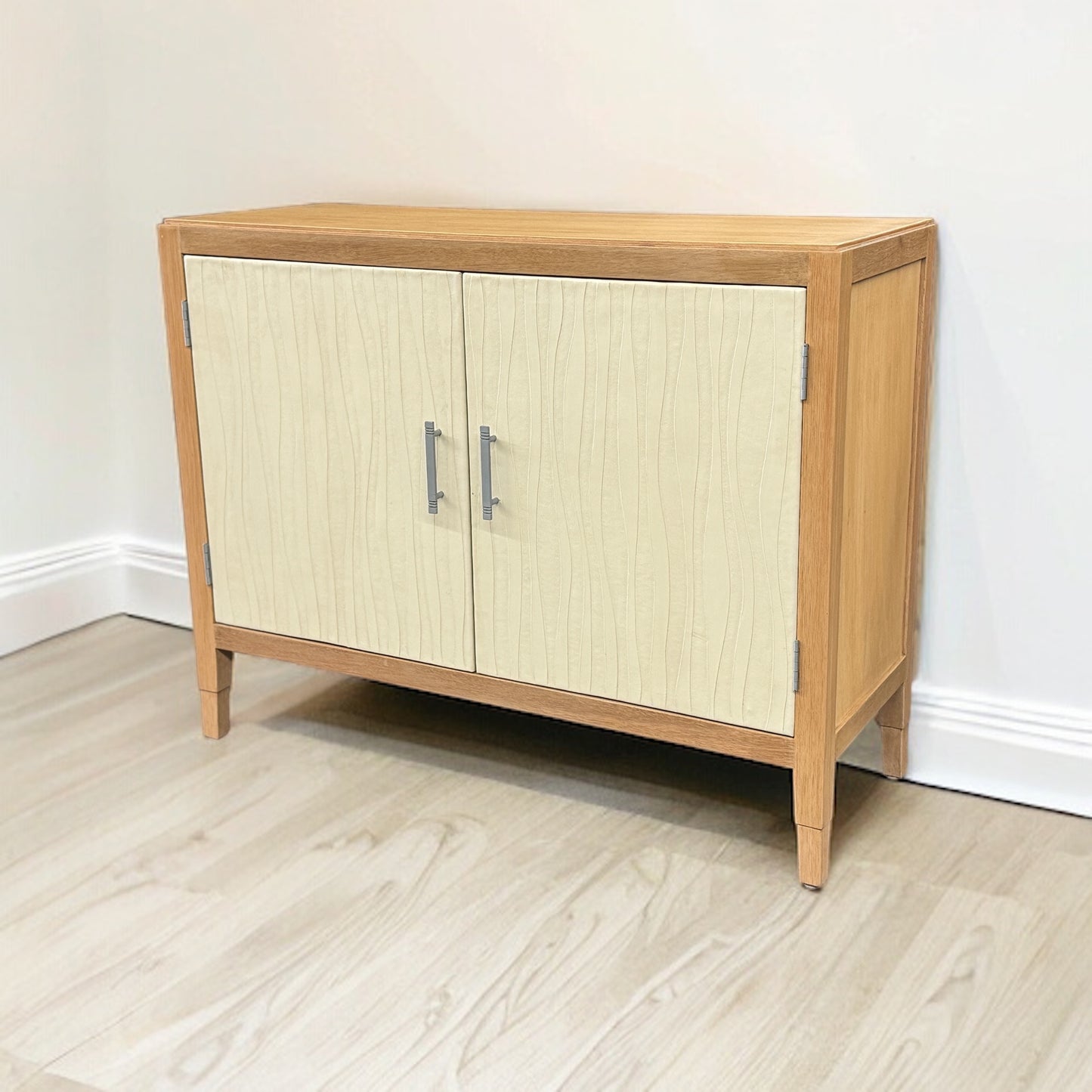 Erquy Chest, White, Storage Cabinet Featuring Textured Wave Pattern Doors and Solid Wood Trim